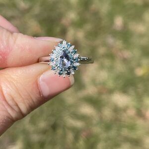 Peacock tanzanite and diamond ring